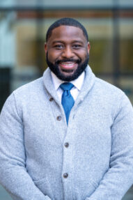 Demetri Morgan smiling